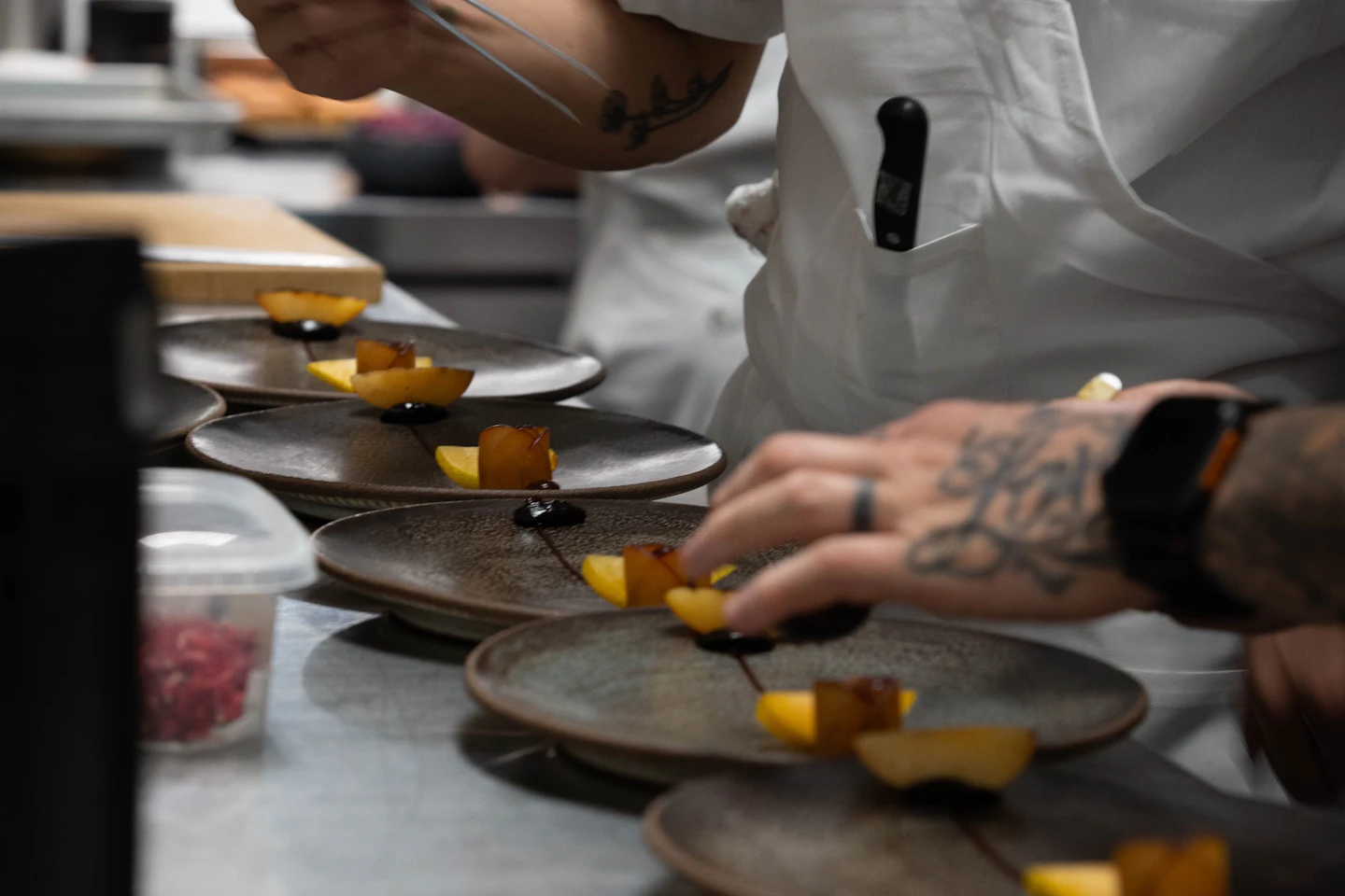 Chef plating seasonal dishes